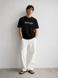 LET IT GO - Premium Unisex Signature Tee | Black