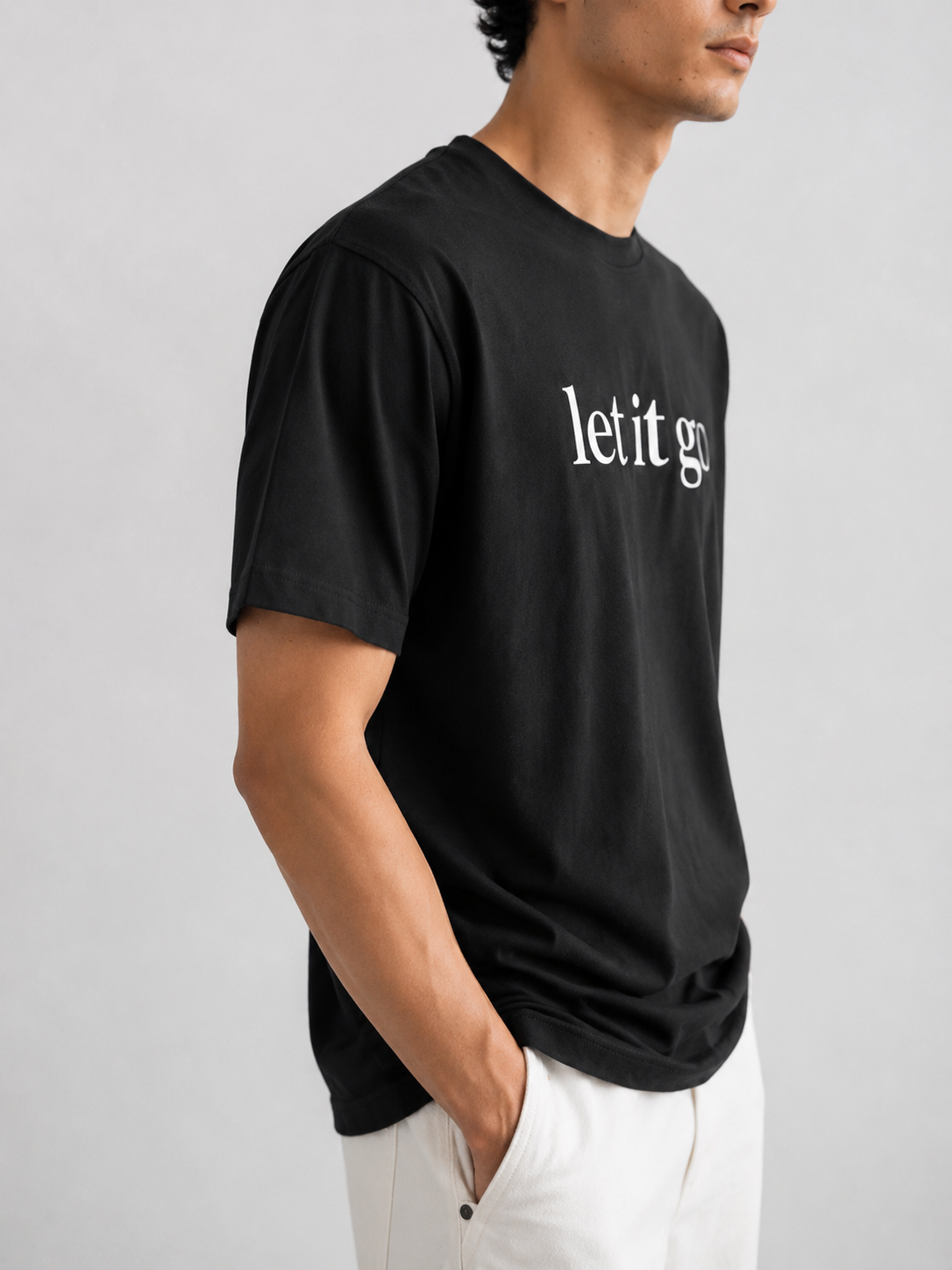 LET IT GO - Premium Unisex Signature Tee | Black
